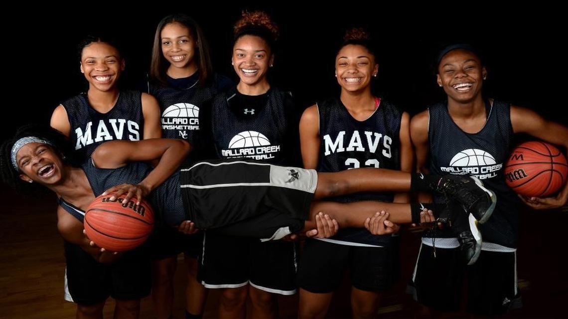 Janay Sanders gets a lift from Mallard Creek teammates Dazia Lawrence (back, left to right), Kay'lla Richardson, Ja'Nea Davis, Ahlana Smith and E'mya Price. The Mavericks will start the season No. 1 in the Observer’s Sweet 16 girls’ poll.