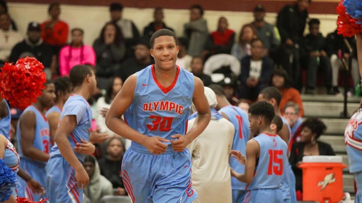 Olympic's Taurus Ragin Jr. is introduced in the starting lineup in Friday’s game at Harding.