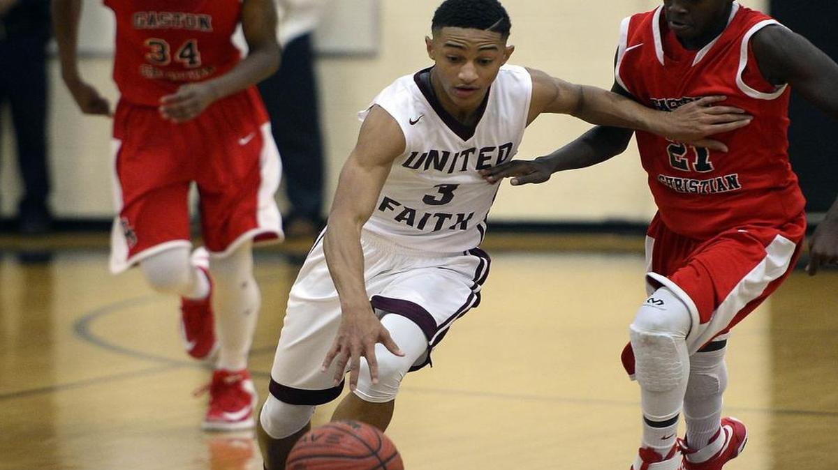 United Faith's Rafael Jenkins (3) drives past Gaston Christian's Cedric Peterson (21) during their game in the Queen City Holiday Classic at Harding High School on Wednesday, December 21, 2016. Jenkins had 12 assists and seven steals in an 88-46 win