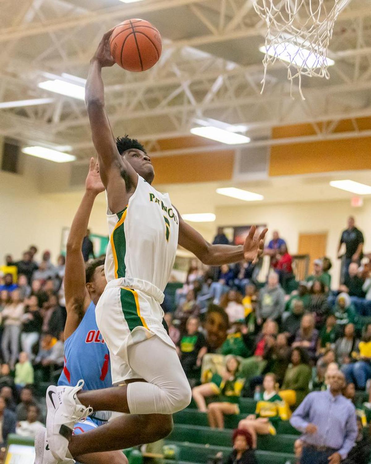 Independence’s Andra’ McKee rises for a dunk