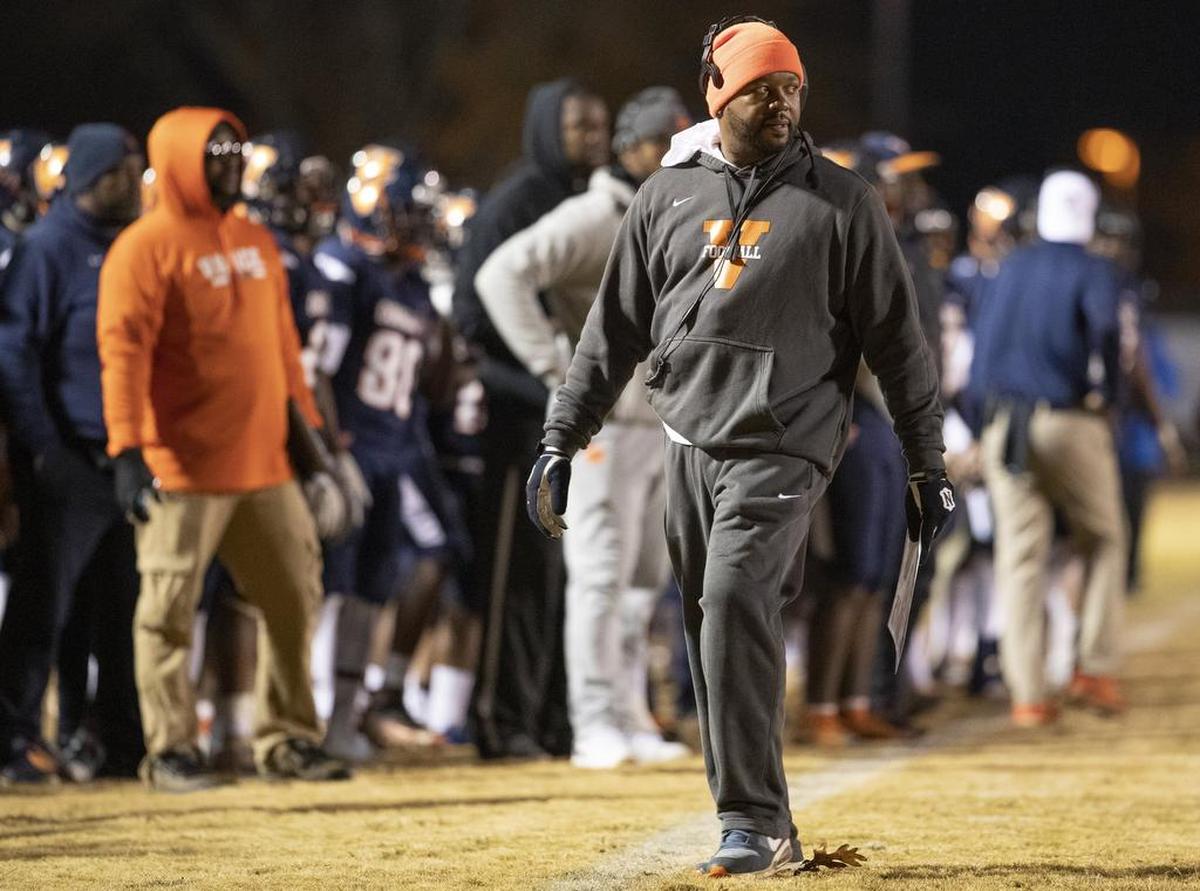 Vance head coach Aaron Brand watches his Cougars play Hough on Friday.