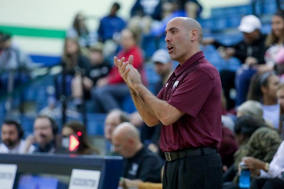 The Spartan’s Head Coach Keith Mason encourages his team to play tighter defense. Sun Valley would defeat Weddington at the buzzer 48-46.