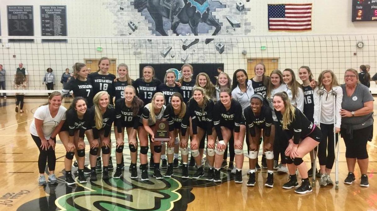 Hough High’s volleyball team poses after winning the N.C. 4A Western Regional championship Tuesday. The Huskies will advance to Saturday’s state final