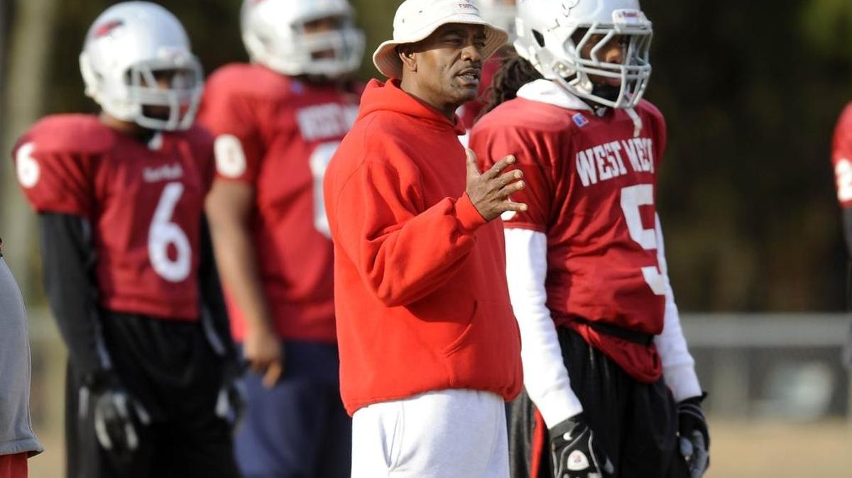 West Meck coach Jeff Caldwell, seen talking to his team in 2012, has resigned as Hawks coach. David T. Foster III-dtfoster@charlotteobserver.com