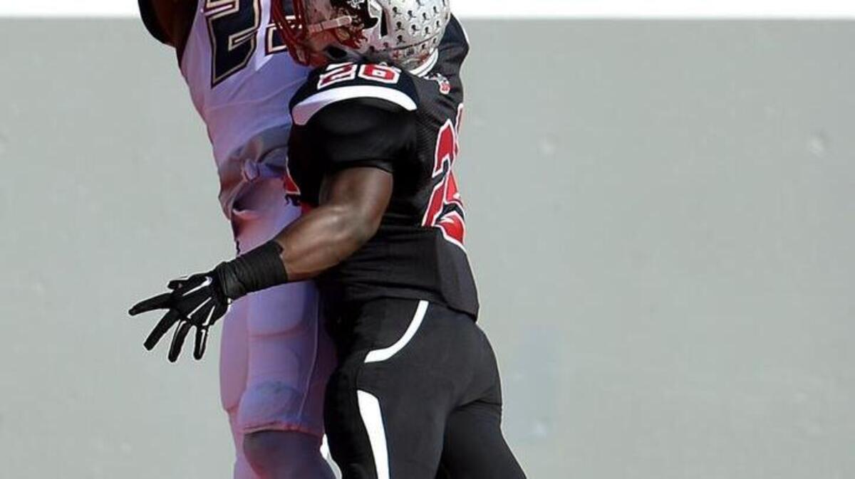 Mallard Creek Mavericks wide receiver Ryan Jones catches a touchdown pass from quarterback James Smith as Page defensive back Micah Gafford tries to knock the ball away during second quarter action at Carter-Finley Stadium in Raleigh, NC on Saturday, December 12, 2015. Mallard Creek defeated Page 49-6 to win the NC 4-AA Championship.