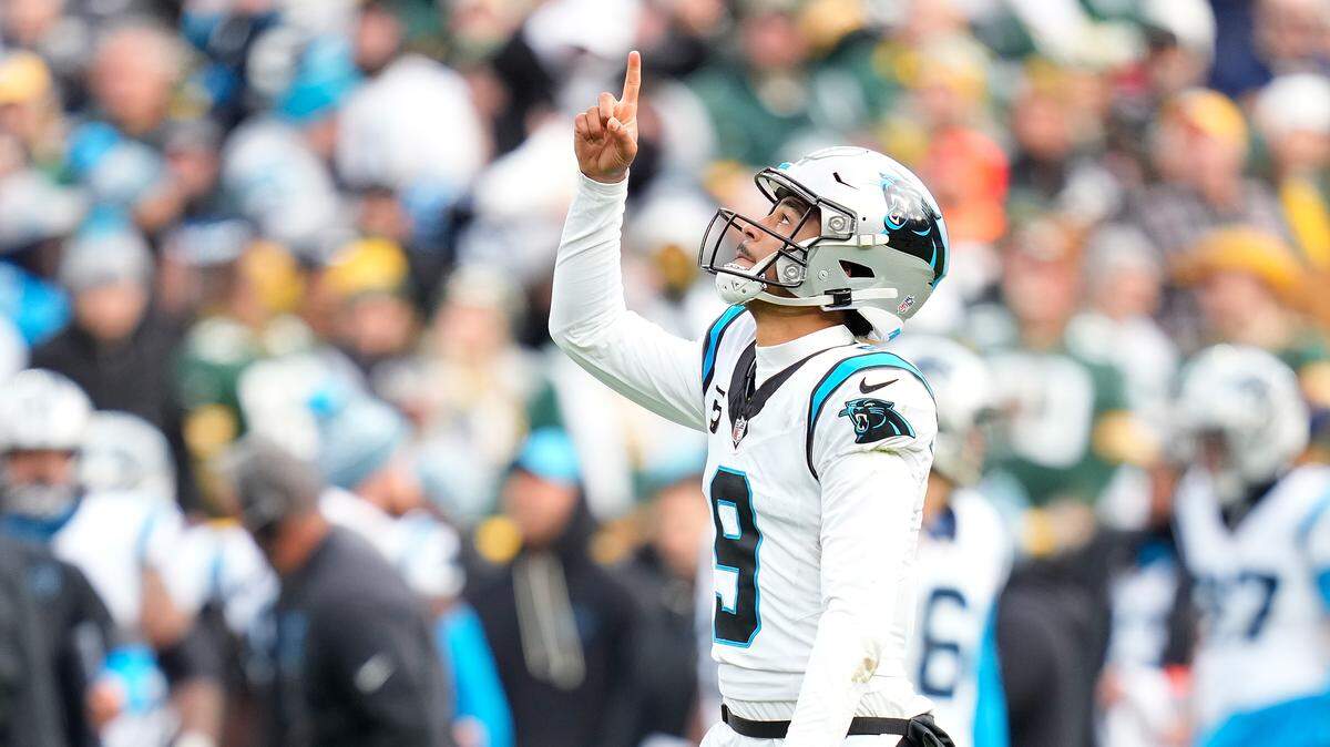 Bryce Young of the Carolina Panthers celebrates a touchdown in the third quarter against the Green Bay Packers in the game at Lambeau Field on November 02, 2025 in Green Bay, Wisconsin. The Panthers upset the Packers, 16-13.