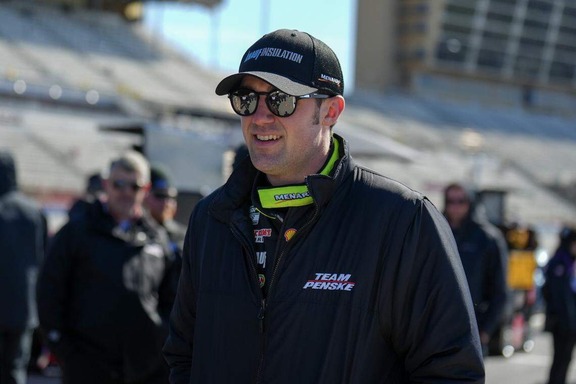 Mar 18, 2023; Hampton, Georgia, USA; NASCAR Cup Series driver Austin Cindric (2) walks to his car during qualifying at Atlanta Motor Speedway. Mandatory Credit: David Yeazell-USA TODAY Sports