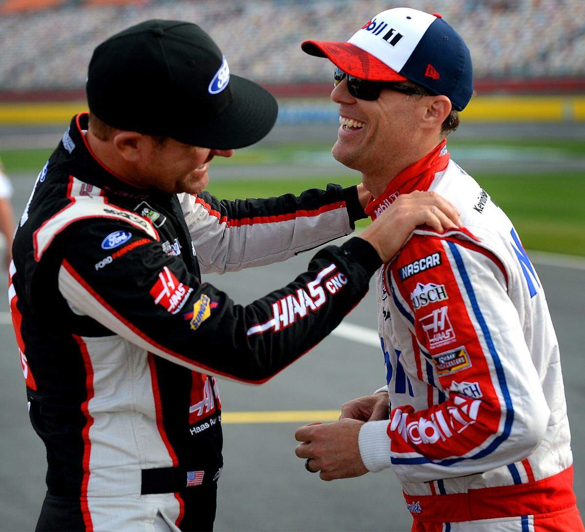 NASCAR drivers Clint Bowyer, left, and Kevin Harvick, right, joke around on pit road prior to qualifying for the Coca-Cola 600 on Thursday, May 25, 2017 at Charlotte Motor Speedway in Concord, NC. Harvick won the pole for the race to be run on Sunday, May 28, 2017.