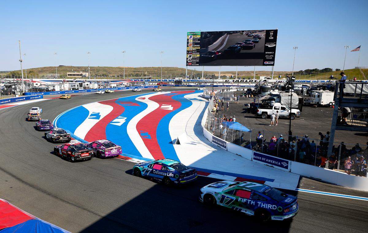 The field of NASCAR drivers drive through Turn 3 during the Bank of America Roval 400 at Charlotte Motor Speedway in Concord, NC on Sunday, October 13, 2024.