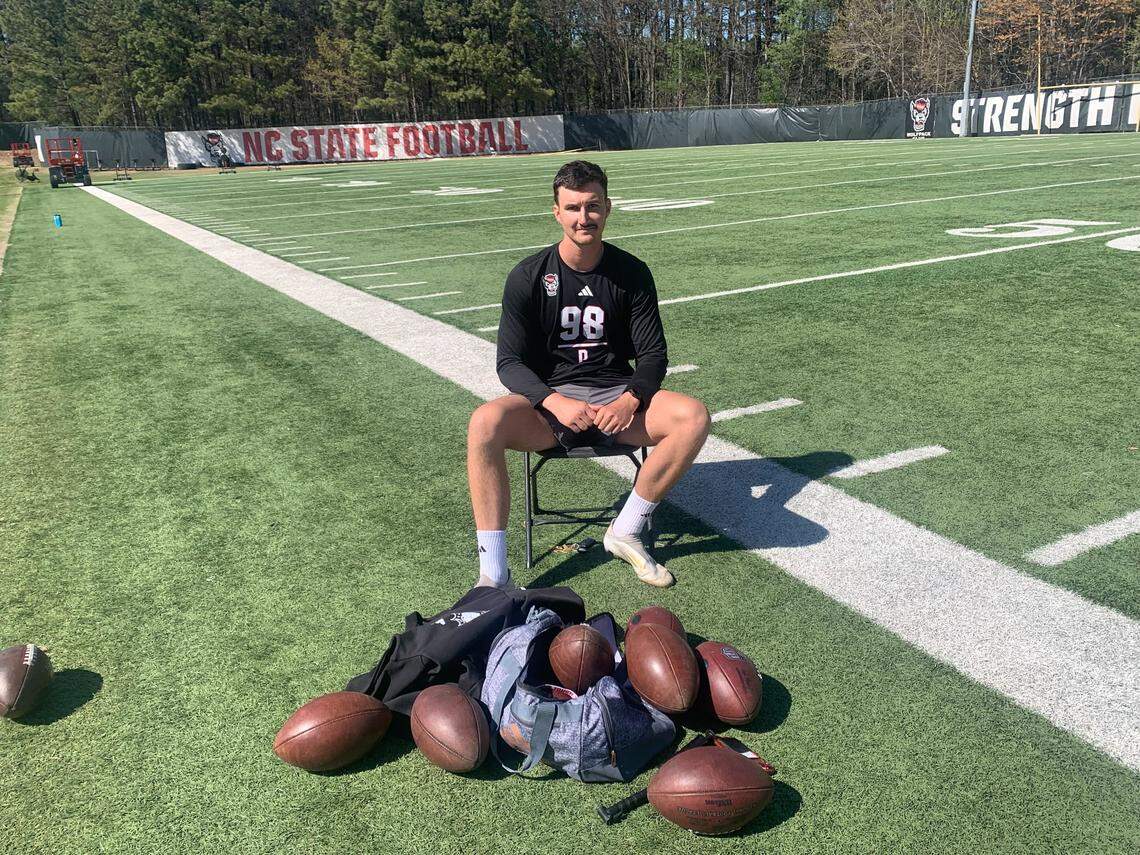 N.C. State punter Caden Noonkester poses for a picture with a bag of footballs following his pro day workout outside of Close-King Indoor Practice Facility in Raleigh, North Carolina on March 24, 2026.