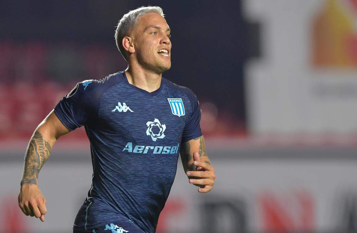Enzo Copetti of Argentina’s Racing Club celebrates after scoring his side’s opening goal against Brazil’s Sao Paulo during a Copa Libertadores soccer match at Morumbi stadium in Sao Paulo, Brazil, Tuesday, July 13, 2021. (Nelson Almeida/Pool via AP)