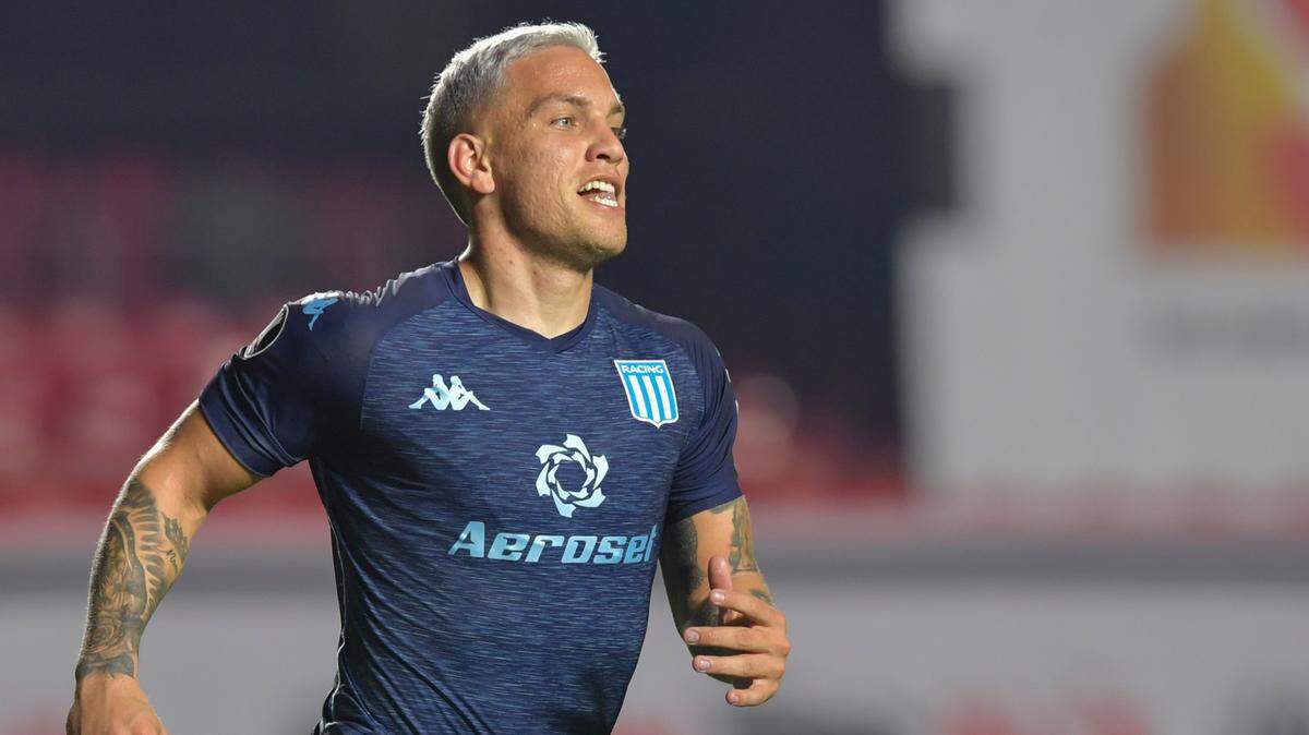 Enzo Copetti of Argentina’s Racing Club celebrates after scoring his side’s opening goal against Brazil’s Sao Paulo during a Copa Libertadores soccer match at Morumbi stadium in Sao Paulo, Brazil, Tuesday, July 13, 2021. (Nelson Almeida/Pool via AP)