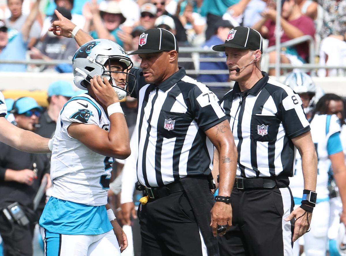 Carolina Panthers quarterback Bryce Young walks away as the referees signal Jacksonville Jaguars’ ball after Young fumbled the ball on a run on Sunday, September 7, 2025 at Everbank Stadium in Jacksonville, Florida.