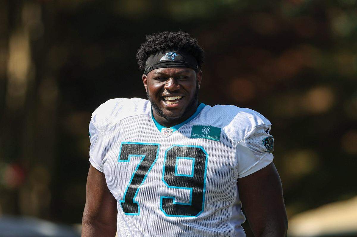 Panthers tackle Ikem Ekwonu walks out to practice at Training Camp on Tuesday, August 2, 2022 in Spartanburg, SC.