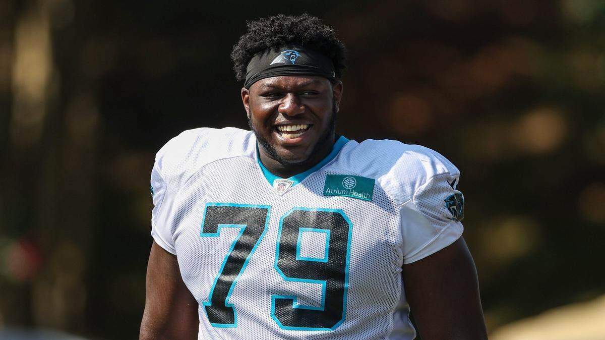 Panthers tackle Ikem Ekwonu walks out to practice at Training Camp on Tuesday, August 2, 2022 in Spartanburg, SC.
