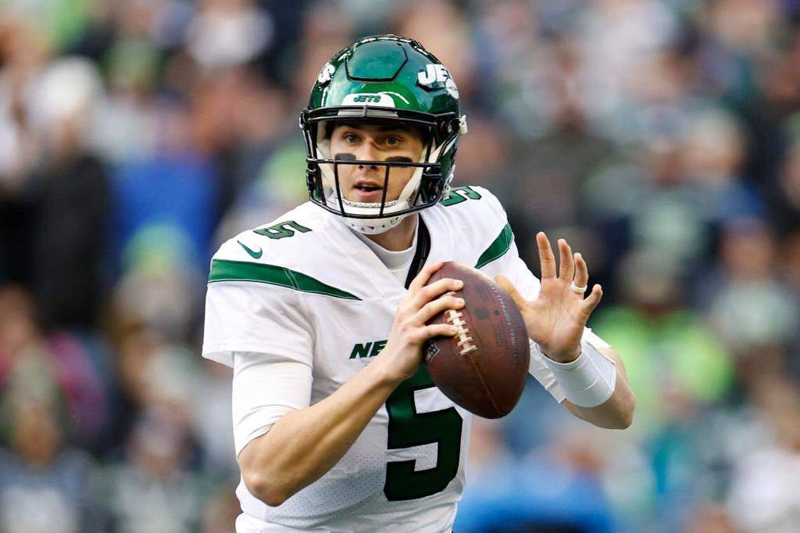 SEATTLE, WASHINGTON - JANUARY 01: Mike White #5 of the New York Jets looks to pass against the Seattle Seahawks during the third quarter at Lumen Field on January 01, 2023 in Seattle, Washington. (Photo by Steph Chambers/Getty Images)