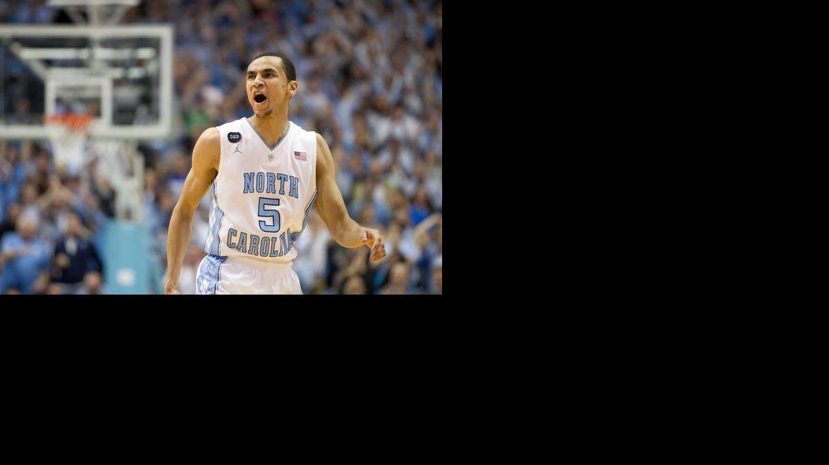
North Carolina’s Marcus Paige (5) reacts after sinking a three-point basket in the second half against Duke on Saturday, March 7, 2015 at the Smith Center in Chapel Hill.
