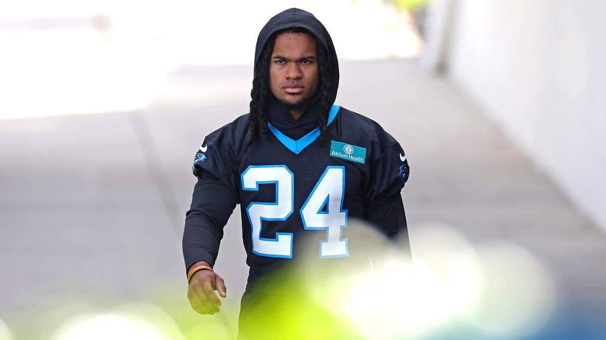 Carolina Panthers rookie running back Jonathon Brooks walks to practice on Monday, November 18, 2024.