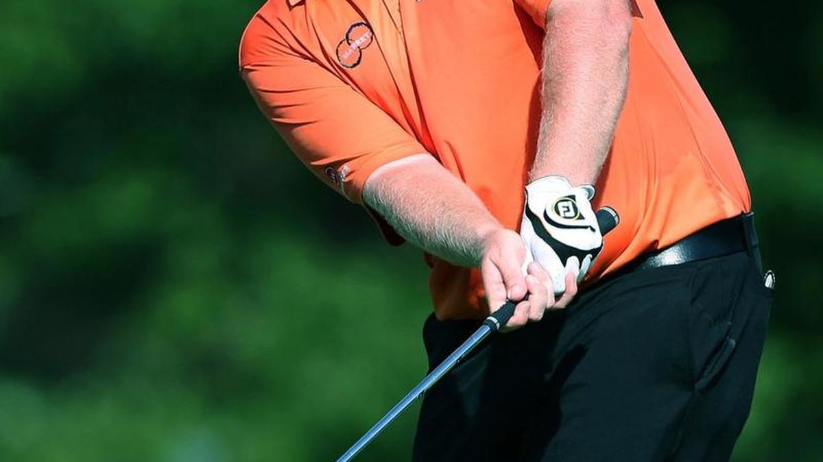 Brad Fritsch of Canada chips onto the green on the 18th hole during the third round of the Wyndham Championship at Sedgefield Country Club on August 16, 2014 in Greensboro, North Carolina. (Photo by Todd Warshaw/Getty Images)