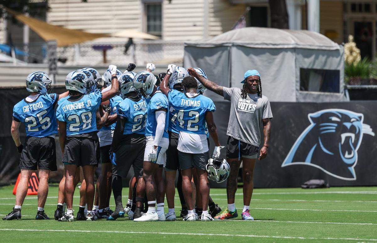 Panthers defensive backs break down their huddle before team scrimmages begin during the second day of minicamp in Charlotte, NC on Wednesday, June 11, 2025.