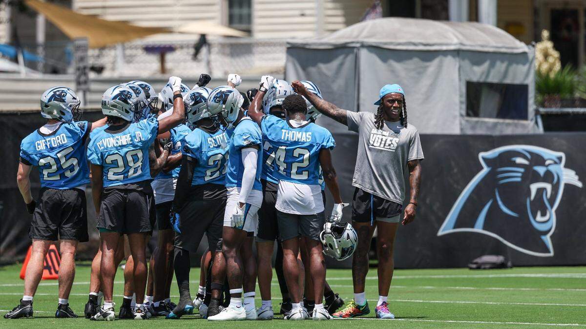 Panthers defensive backs break down their huddle before team scrimmages begin during the second day of minicamp in Charlotte, NC on Wednesday, June 11, 2025.