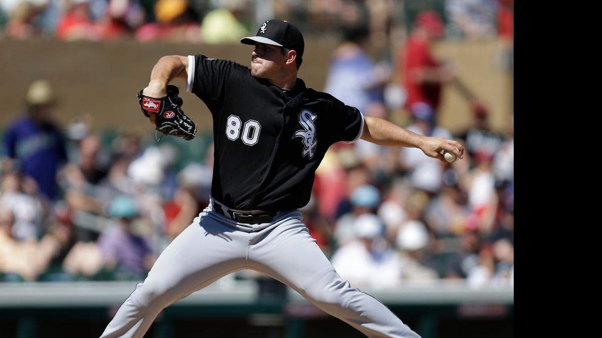 
Chicago White Sox pitcher Carlos Rodon works against the Arizona Diamondbacks in the first inning of a spring training exhibition baseball game Monday, March 16, 2015, in Scottsdale, Ariz. 
