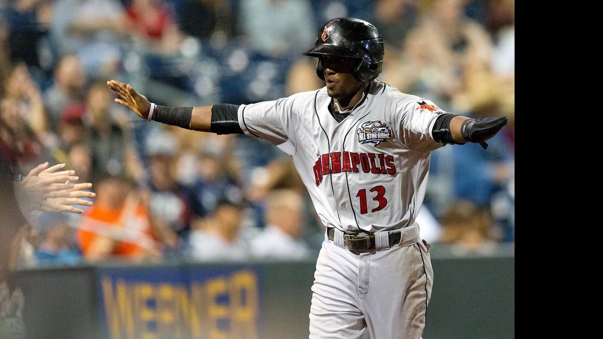 
Indianapolis Indians' Alen Hanson scores the winning run in the ninth inning for the International League in its 4-3 victory over the Pacific Coast League Wednesday night in the Triple-A All-Star baseball game in Omaha, Neb.


