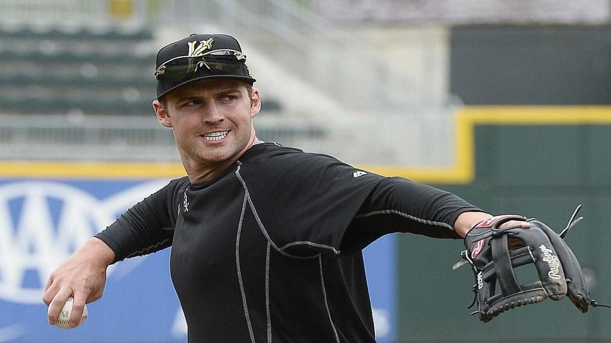 Charlotte Knights infielder Matt Davidson makes a throw from third base at practice during the Charlotte Knights media day at BB&T Ballpark on April 06, 2016.