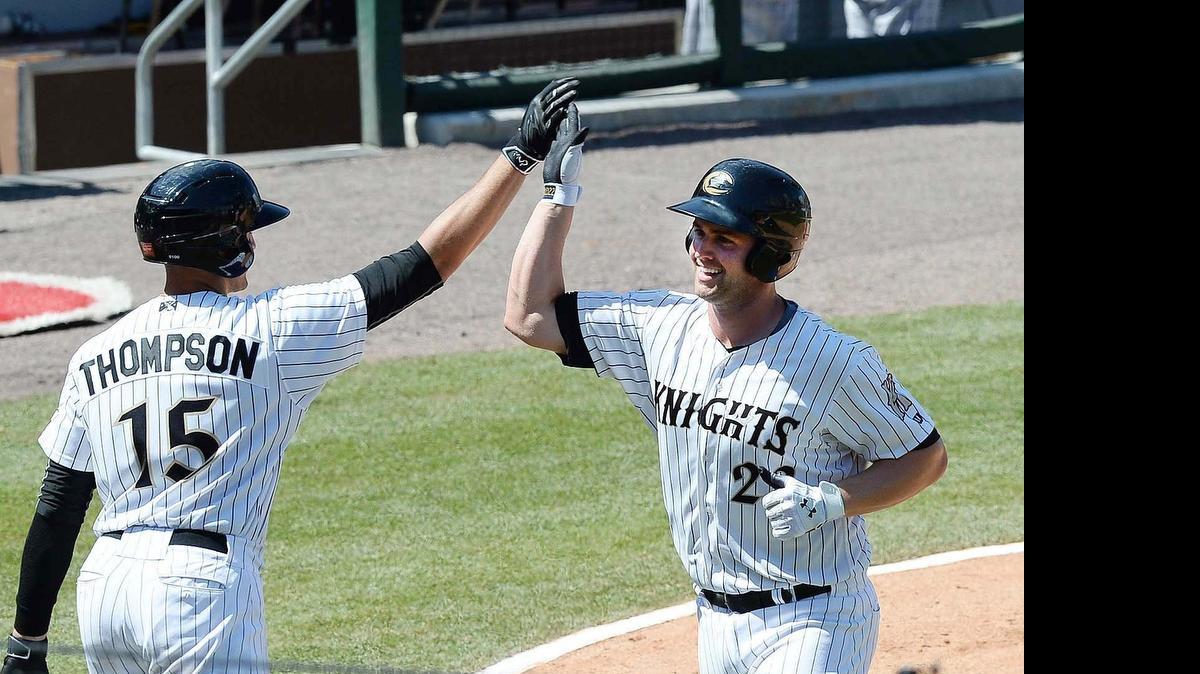 
The Charlotte Knights’ Matt Davidson, right, shown here celebrating a recent home run with Trayce Thompson at BB&T BallPark. Davidson, a third baseman, and Thompson, an outfielder, will play in the Triple-A All-Star Game July 15 in Omaha, Neb.
