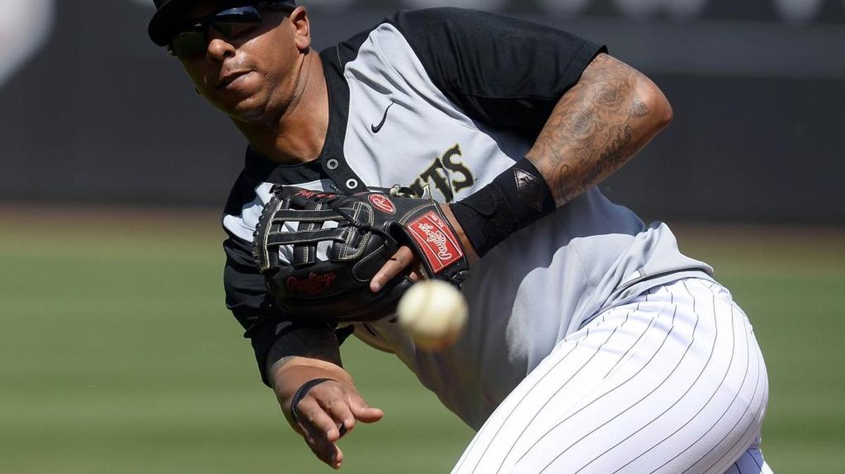 Charlotte Knights infielder Yoan Moncada, last year’s minor-league player of the year, throws to first base during media day Tuesday.