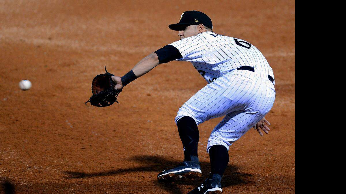 
Charlotte Knights first baseman Neftali Soto fields a throw to first for a Gwinnett Braves’ out during action at BB&T BallPark on Friday, April 17, 2015.
