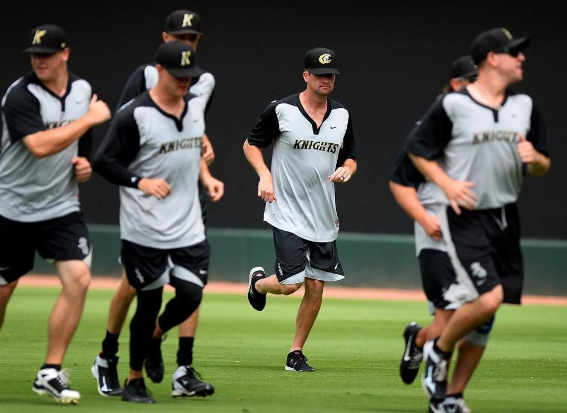 Charlotte Knights reliever Bobby Parnell, center, jogs with teammates at BB&T Ballpark before Friday’s International League game against Gwinnett. Parnell, a former New York Mets pitcher, grew up in Salisbury and attended East Rowan High.