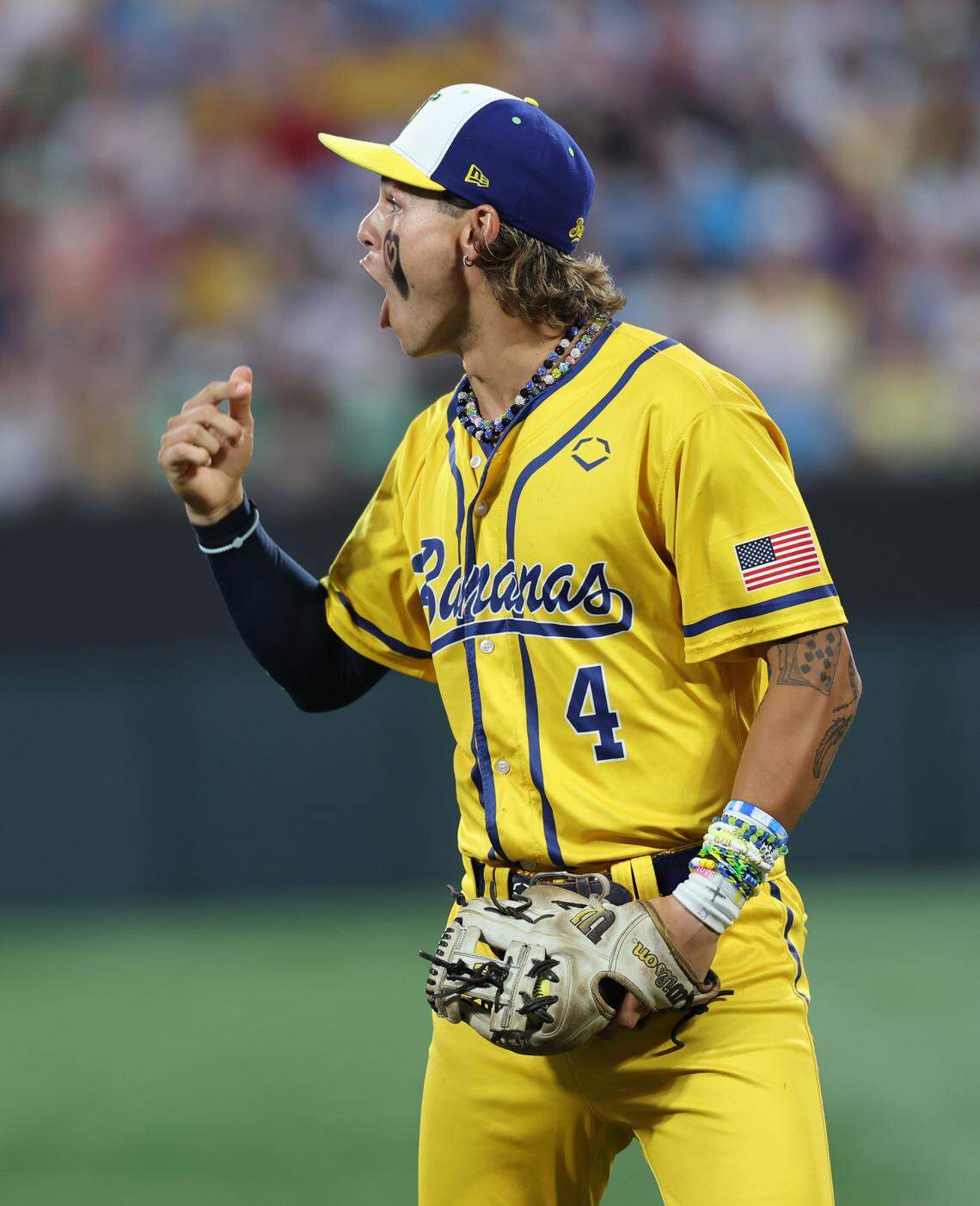 K.J. Jackson yells to a teammate after he catches a ball while doing a backwards flip Friday, June 6, 2025 at Bank of America Stadium in Charlotte