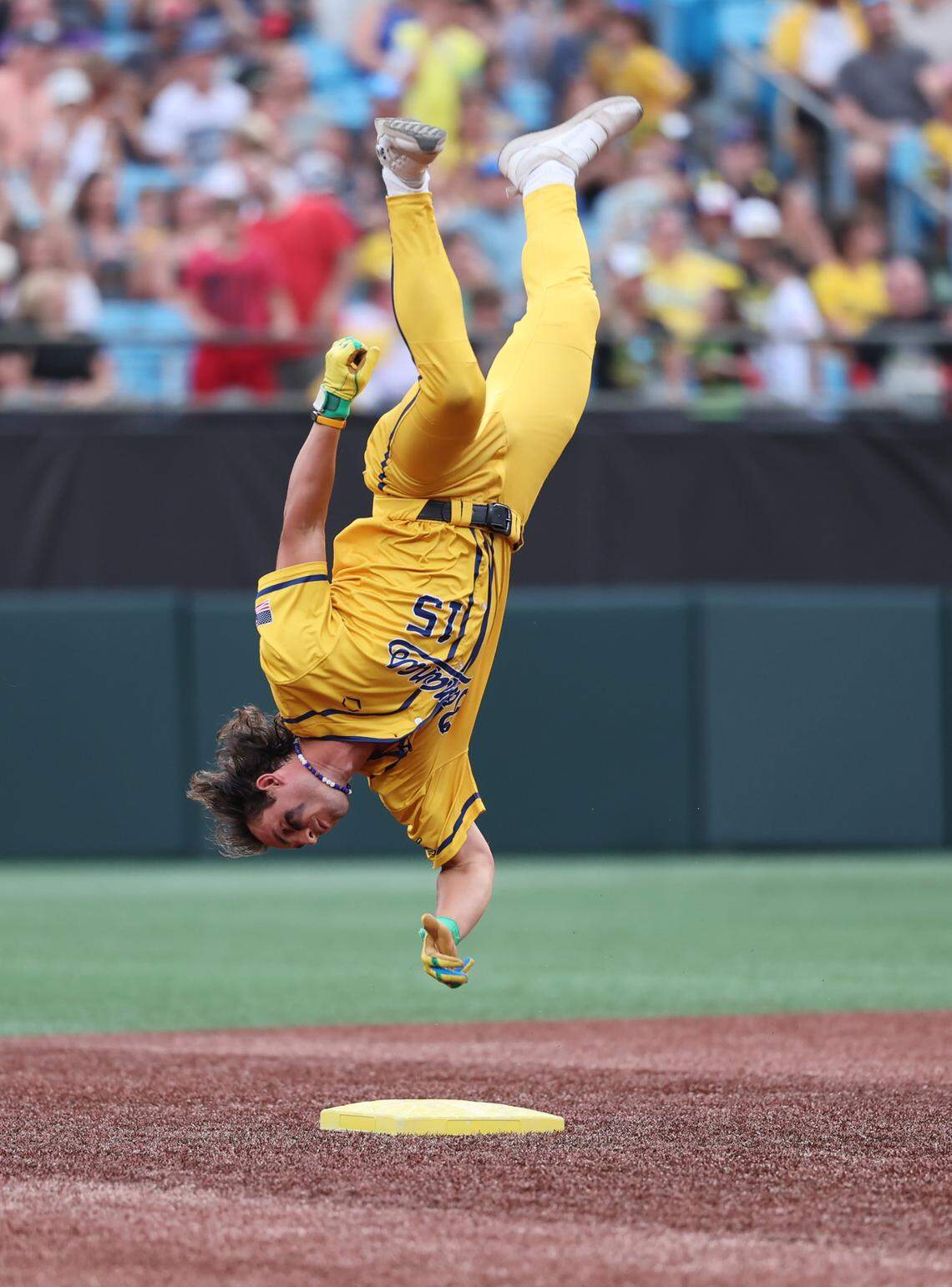 Bananas’ Robert Anthony Cruz does a flip at second base Friday, June 6, 2025 at Bank of America Stadium in Charlotte.