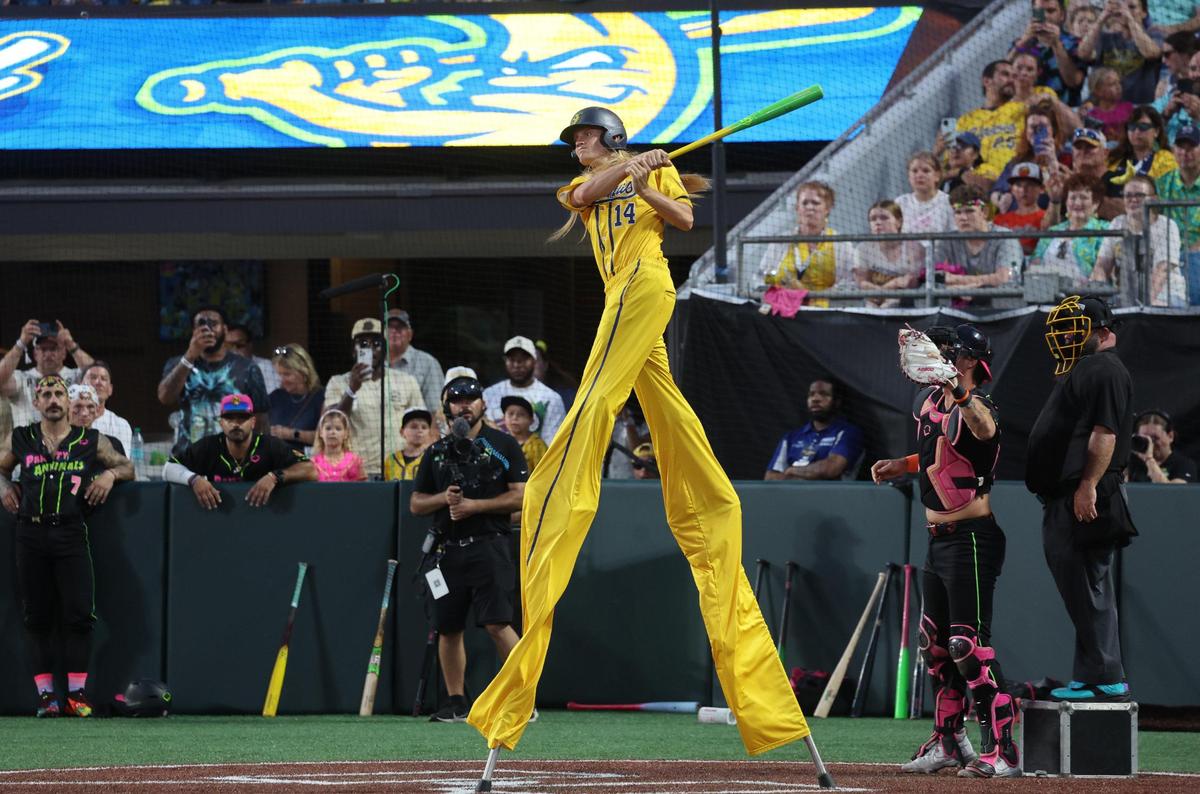 Savannah Bananas Dakota Albritton swings at the ball Saturday, June 7, 2025 at Bank of America Stadium in Charlotte.