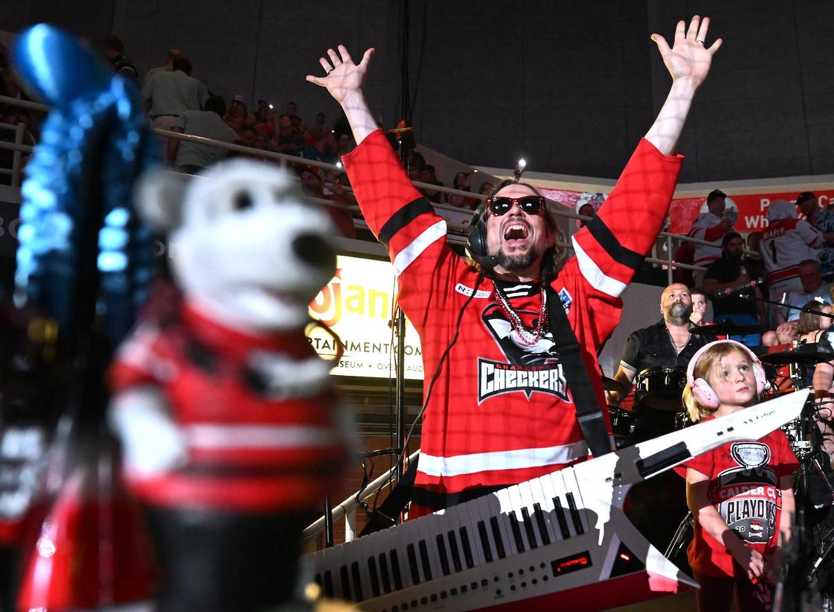 Charlotte Checkers organist Greazy Keyz entertains the crowd during action the team’s Calder Cup game against the Canucks on Sunday, June 15, 2025 at Bojangles Coliseum in Charlotte, NC. The Checkers defeated the Canucks 3-2. The series is tied at 1-1.