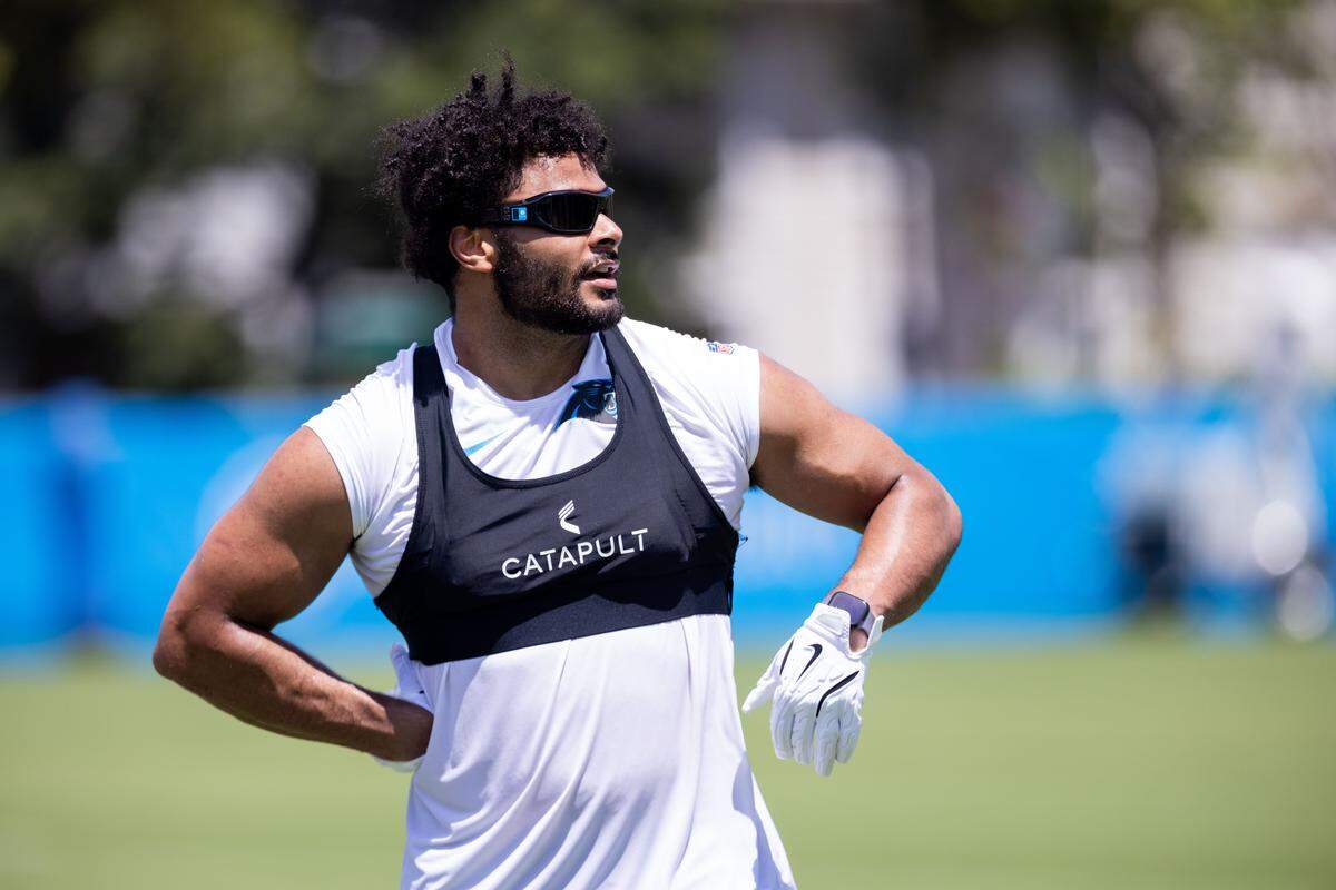 Carolina Panthers tight end Tommy Tremble (82) walks off after practice at training camp on July 26, 2025. 