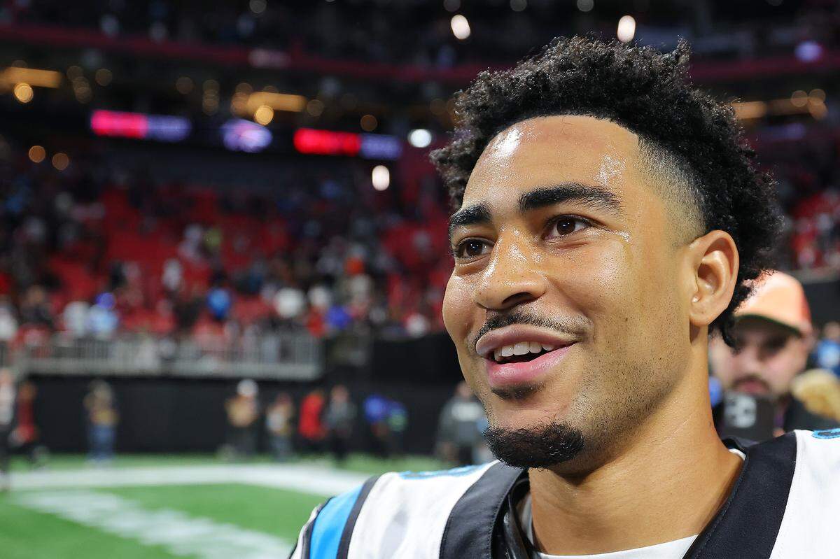Bryce Young #9 of the Carolina Panthers celebrates after defeating the Atlanta Falcons 44-38 at Mercedes-Benz Stadium on January 05, 2025 in Atlanta, Georgia.