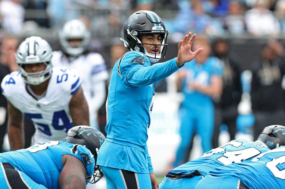 Carolina Panthers quarterback Bryce Young gives direction to the receivers at the line of scrimmage during action against the Dallas Cowboys on Sunday at Bank of America Stadium. The Panthers defeated the Cowboys 30-27.