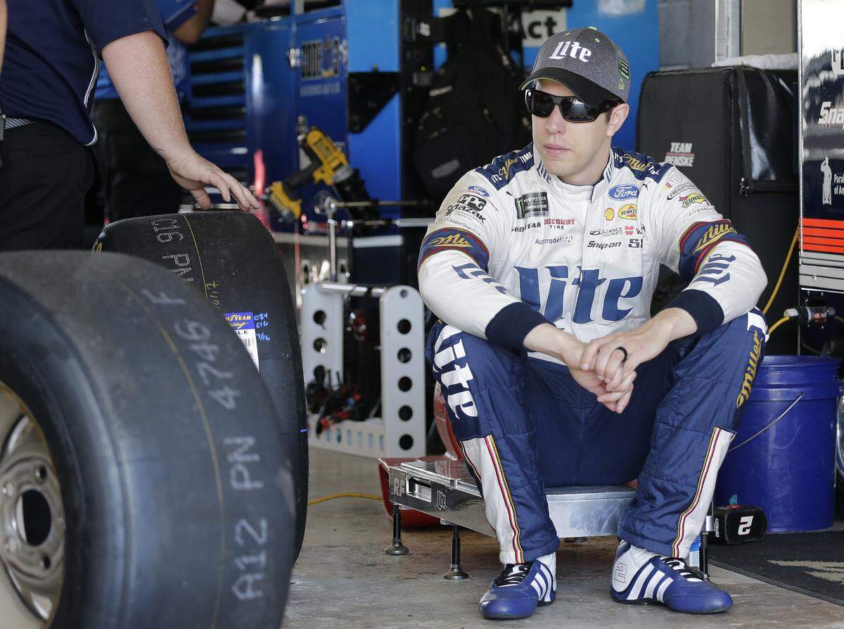 Brad Keselowski waits for his crew to prepare his car before practice for Sunday’s NASCAR Cup Series auto race at Homestead-Miami Speedway in Homestead, Fla., Friday, Nov. 17, 2017.(AP Photo/Terry Renna)