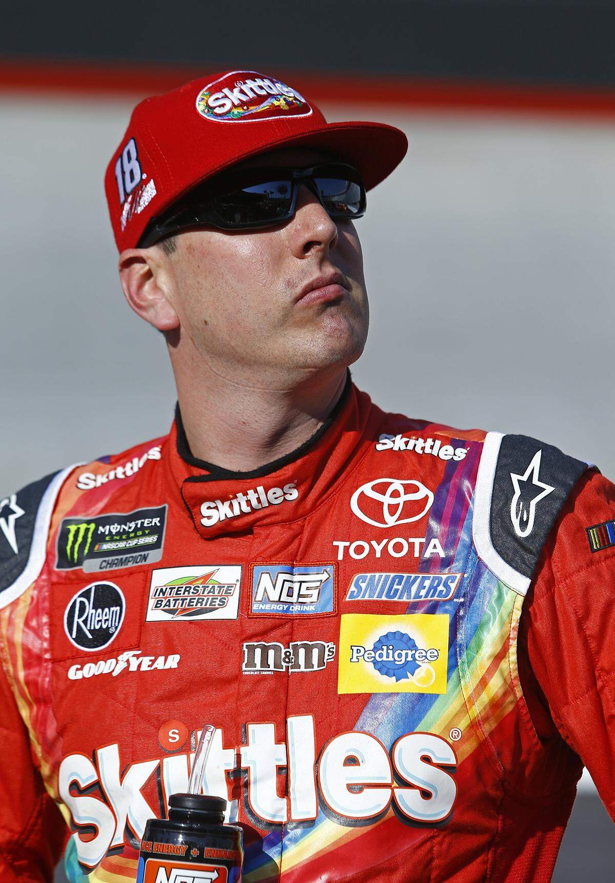 Kyle Busch looks on after qualifying on the pole for a NASCAR Cup Series auto race, Friday, April 13, 2018, in Bristol, Tenn. (AP Photo/Wade Payne)