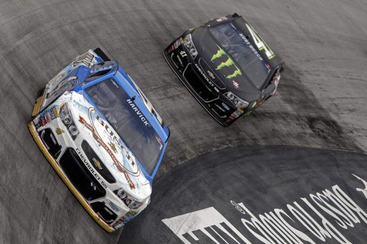 Driver Kevin Harvick (4) leads Kurt Busch (41) through a turn at Bristol Motor Speedway. The Bass Pro Shops NRA Night Race is scheduled for Saturday at 7:30 p.m. in Bristol, Tenn.