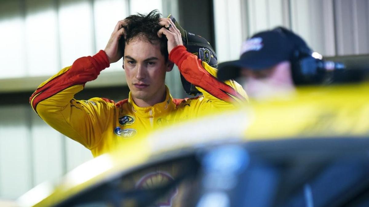 Joey Logano stands in the garage area after an on-track incident with Matt Kenseth in Sunday’s race at Martinsville Speedway.