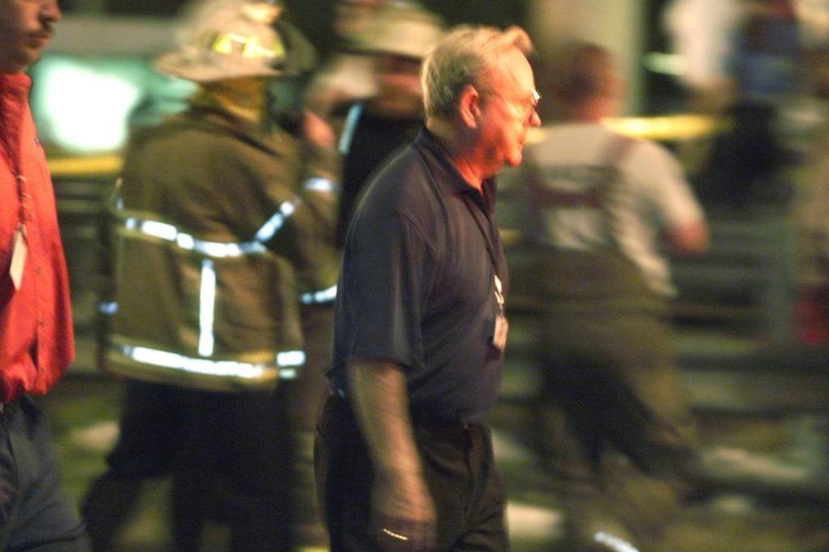 H.A. “Humpy” Wheeler, then-president of what is now Charlotte Motor Speedway, rushes to the scene of the May 20, 2000, pedestrian bridge collapse at the speedway.