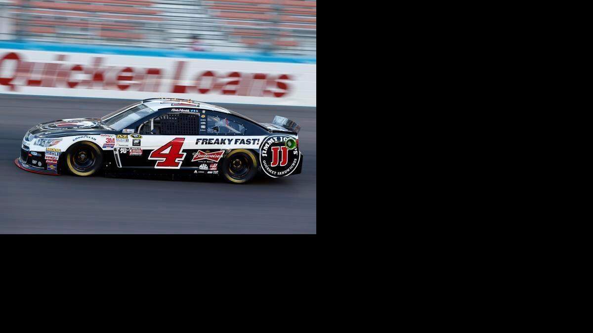 
Kevin Harvick drives during qualifying for Sunday's NASCAR Sprint Cup Series auto race, Friday, March 13, 2015, in Avondale, Ariz. Harvick won the pole.
