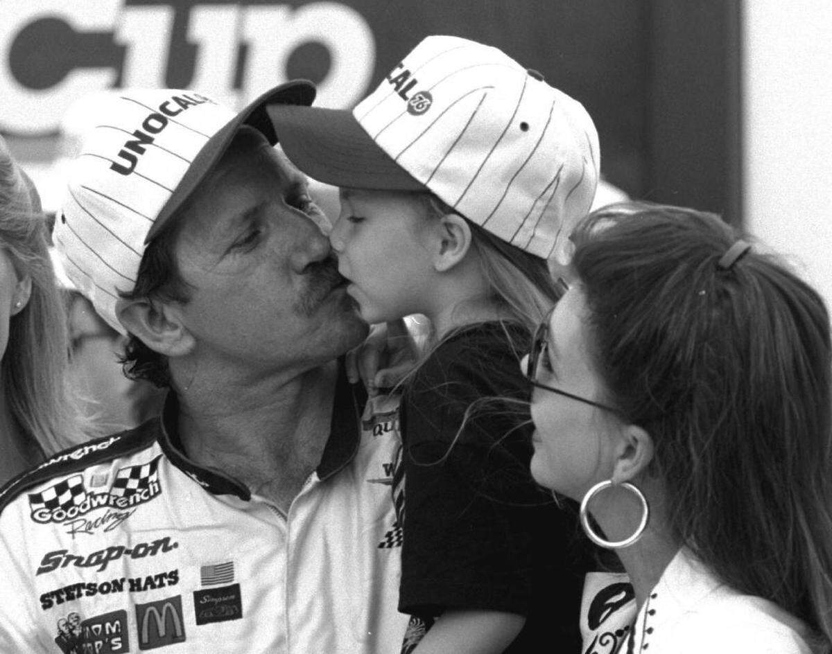 Dale Earnhardt Sr. gets a Victory Lane kiss from daughter Taylor Nicole after winning the March 1994 Cup Series race at Darlington Raceway.