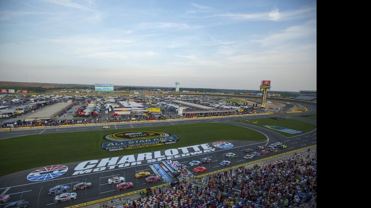 
Drivers make their way down the front stretch to start the NASCAR Sprint Showdown auto race at Charlotte Motor Speedway in Concord, Friday, May 15, 2015. 
