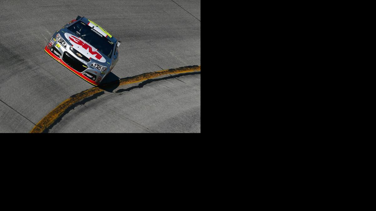 
Jeff Gordon, driver of the No. 24 Chevrolet, circles the track during practice for the NASCAR Sprint Cup Series Folds of Honor QuikTrip 500 at Atlanta Motor Speedway on Friday. Despite a new rules package that brought a reduction in horsepower and downforce intended to decrease speeds and produce better racing, the cars were faster on Thursday and Friday than a season ago. 
