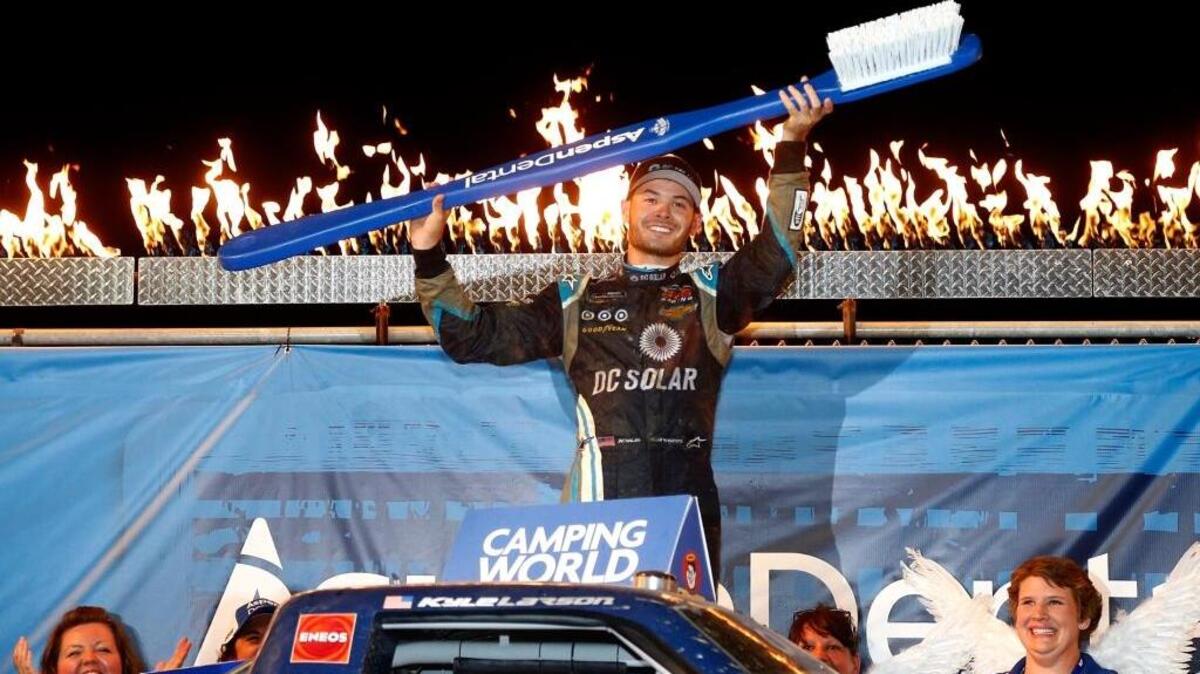 Kyle Larson celebrates after winning Wednesday night’s NASCAR Camping World Series 4th Annual Aspen Dental Eldora Dirt Derby 150 at Eldora Speedway in Rossburg, Ohio.