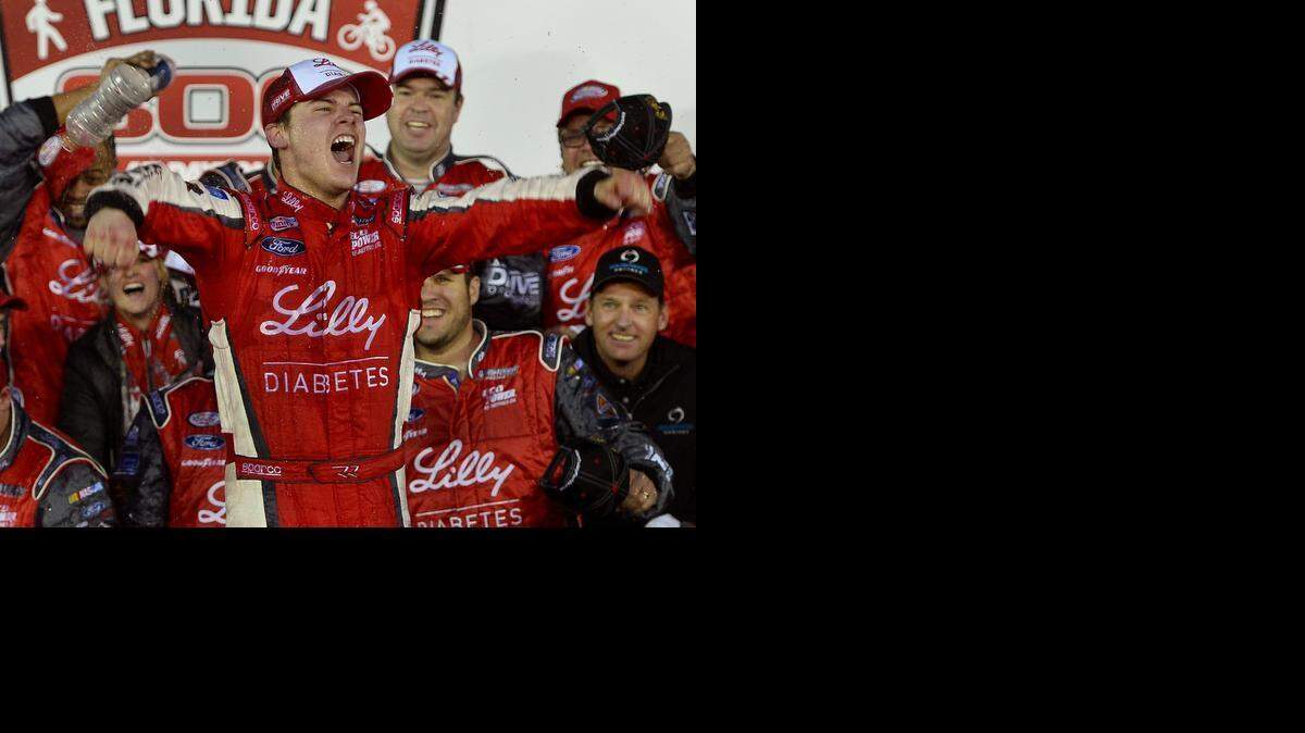 NASCAR Xfinity Series driver Ryan Reed and his team celebrate their victory in the 34th Annual Alert Today Florida 300 at Daytona International Speedway on Saturday.